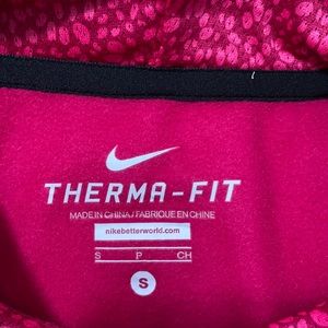 Fuchsia colored Nike hoodie.